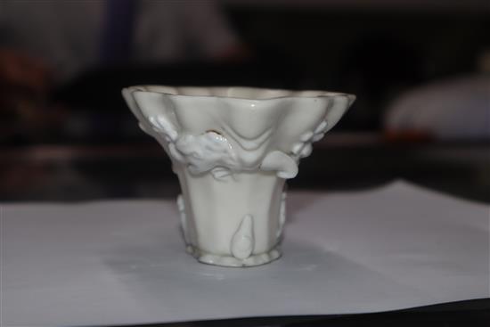 A Chinese blanc de chine dragon libation cup